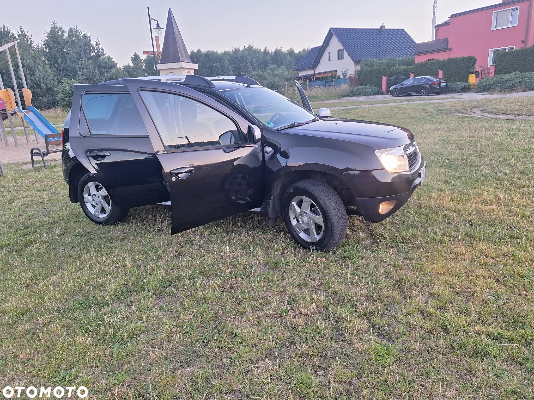 Dacia Duster 1.6 16V 4x2 Prestige - 14