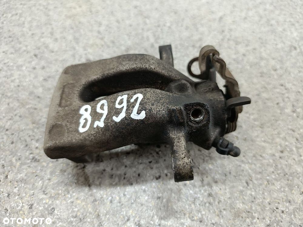 ZACISK HAMULCOWY PRAWY TYŁ OPEL ZAFIRA B  1.9 CDTI - 1
