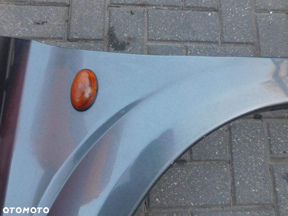 błotnik lewy przód CHRYSLER DODGE VOYAGER IV 00-08 - 6