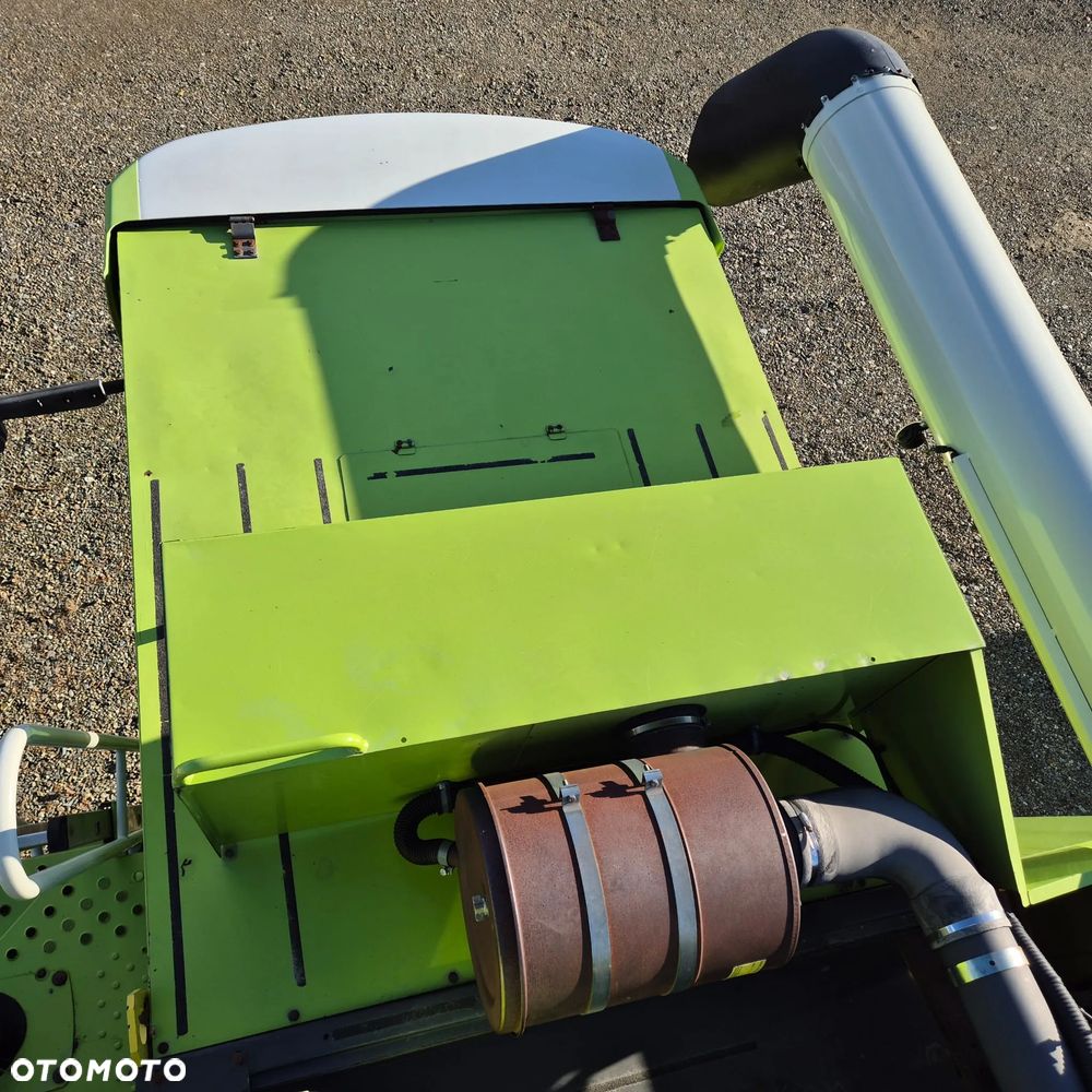 Claas Lexion 650 z hederem - 8