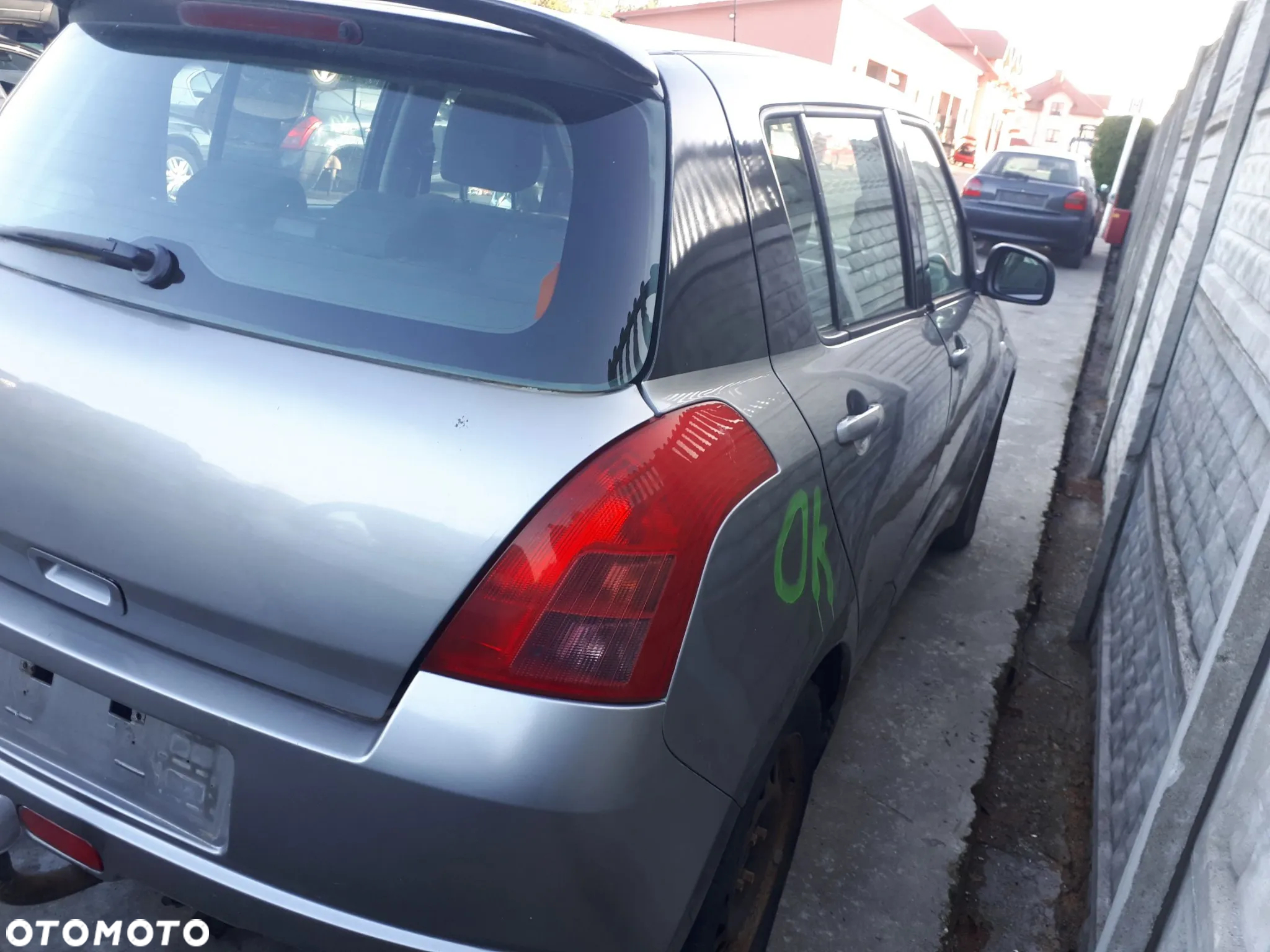 SUZUKI SWIFT 04-08 BŁOTNIK PRZÓD PRZEDNI PRAWY LEWY - 12
