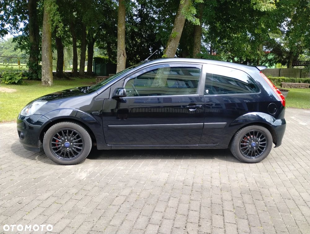 Ford Fiesta 1.4 Ghia - 4