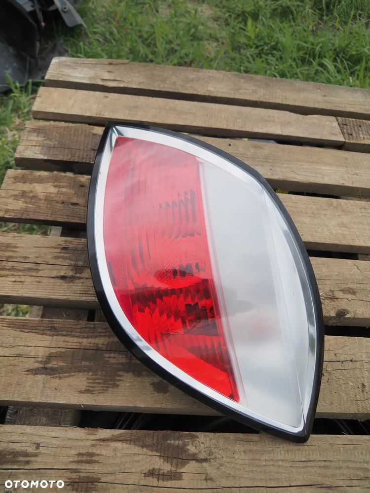 Lampa tył tylna prawa Opel Astra H III HB 24451837 - 2