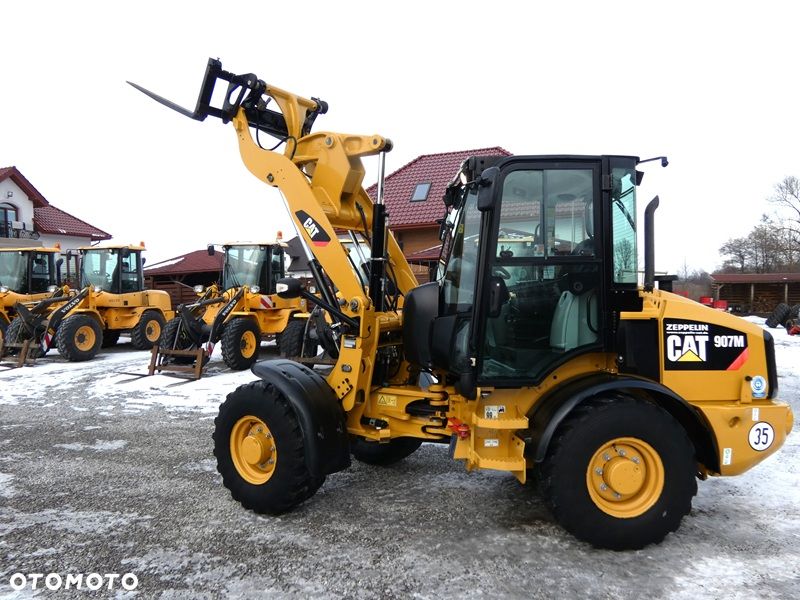 Caterpillar CAT 907M Z Niemiec / Wyjątkowo Wyposażony / 35km/h / 3.050mtg / - 39