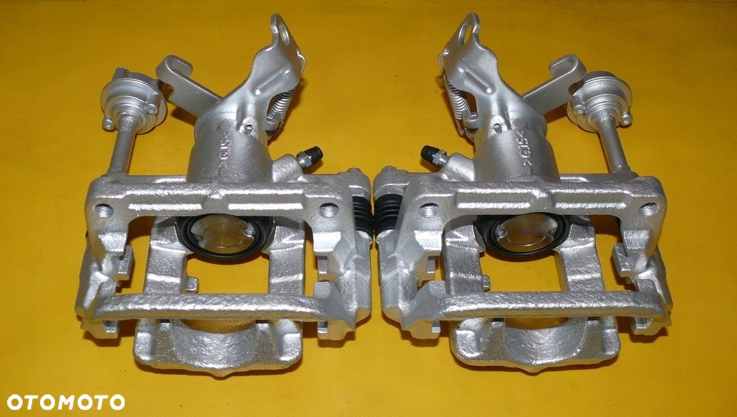 ZACISKI HAMULCOWE JARZMA LEWY PRAWY TYŁ OPEL ASTRA 4 IV J 292/12mm - 4