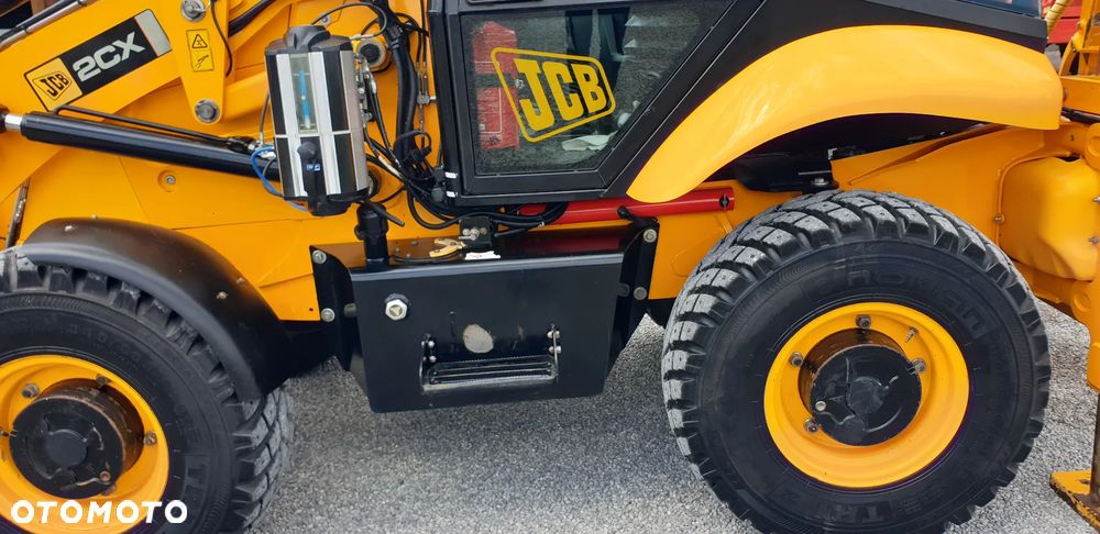 JCB 2CX tylko 2835mtg! z ROTOTILT / 3 łyżki /widły/centralne smarowanie/klimatyzacja / STAN IDEALNY !! - 17