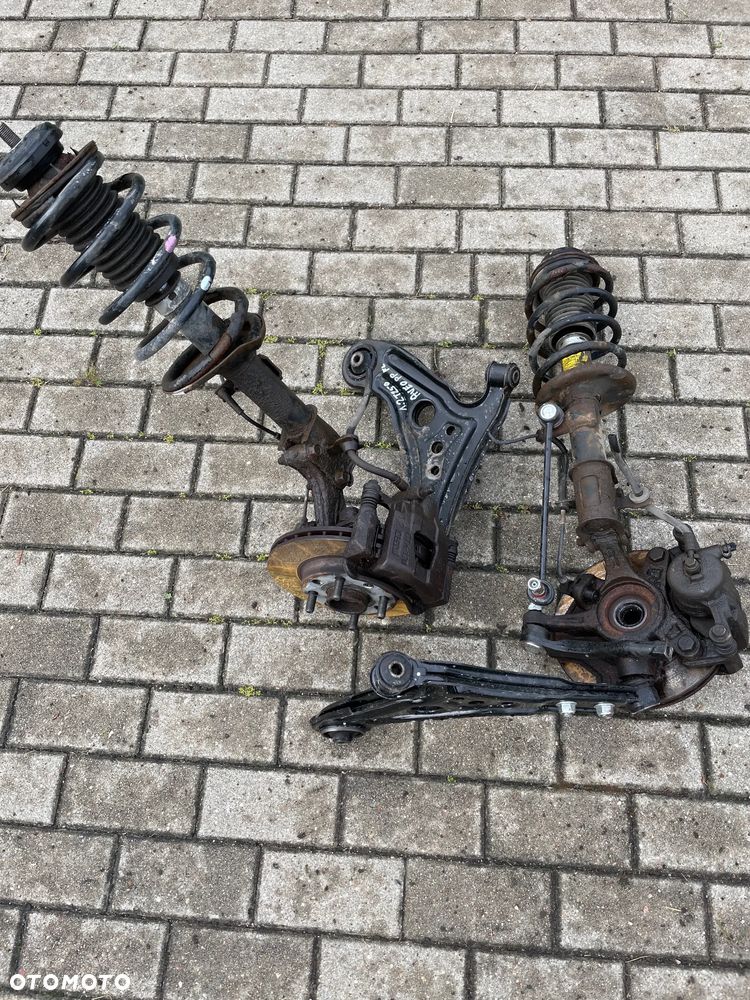 MC Pherson AMORTYZATOR przód PRAWY LEWY ZWROTNICA AVEO 1,2 16V T250 LIFT 07-
