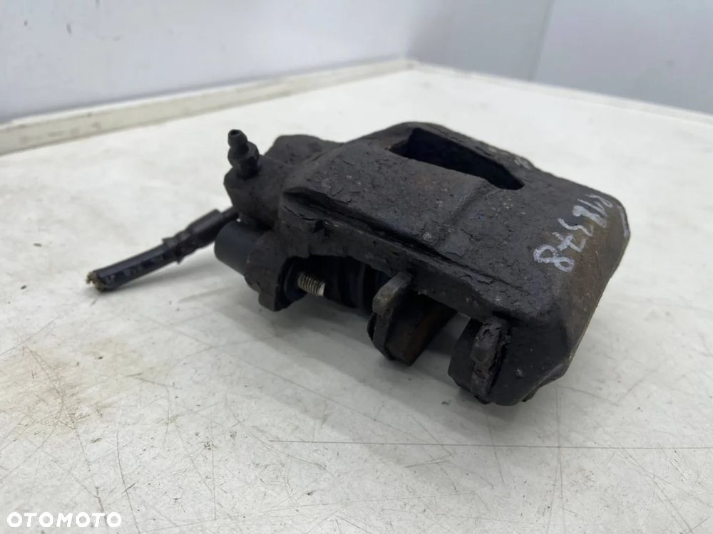 Zacisk hamulcowy VW Golf IV V VI Polo III IV Audi A3 8l 8p Leon I II Ibiza III IV Fabia I II III Octavia I II Caddy III 97-12r. prawy przedni jarzmo - 11