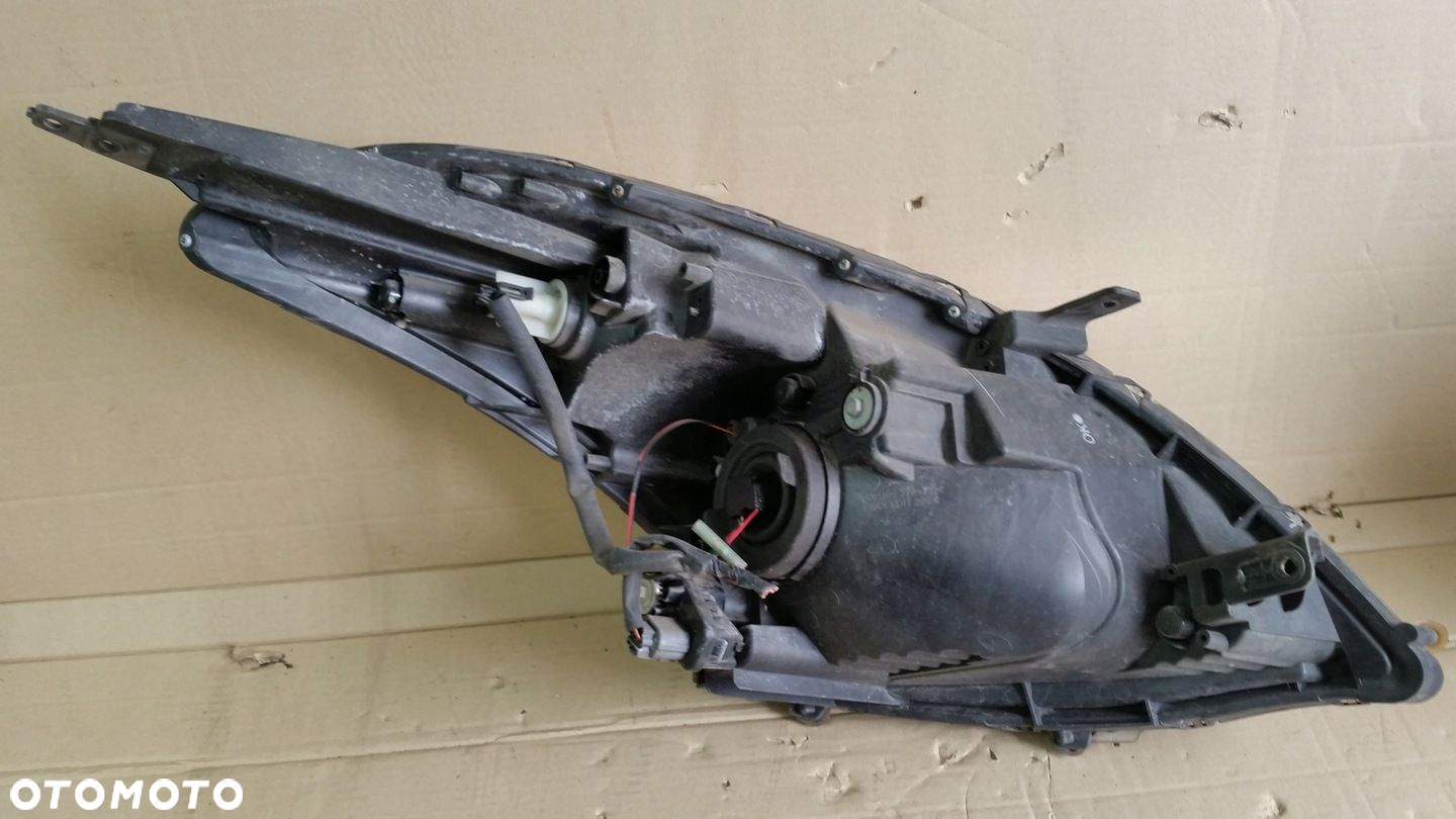 LAMPA LEWA REFLEKTOR SUZUKI SWIFT MK7 10- - 7