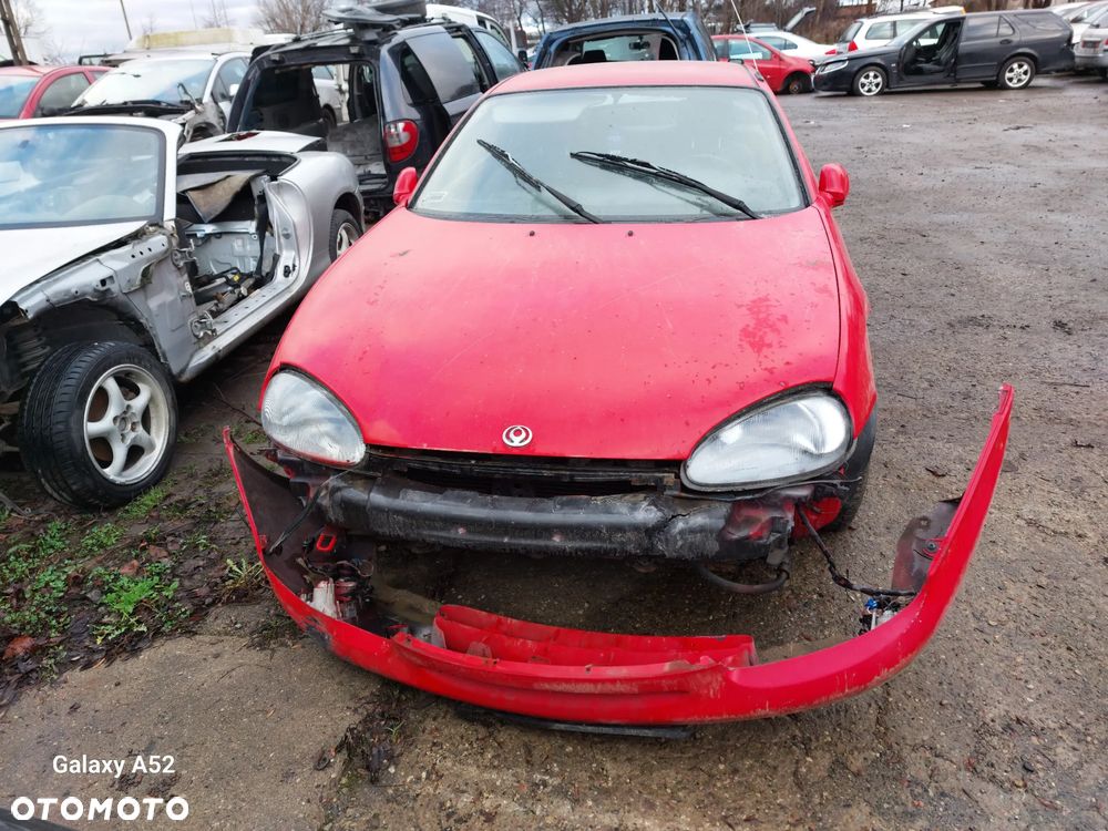 Maska MAZDA MX3 97R. zderzaki,lampy,drzwi,klapa..... - 1