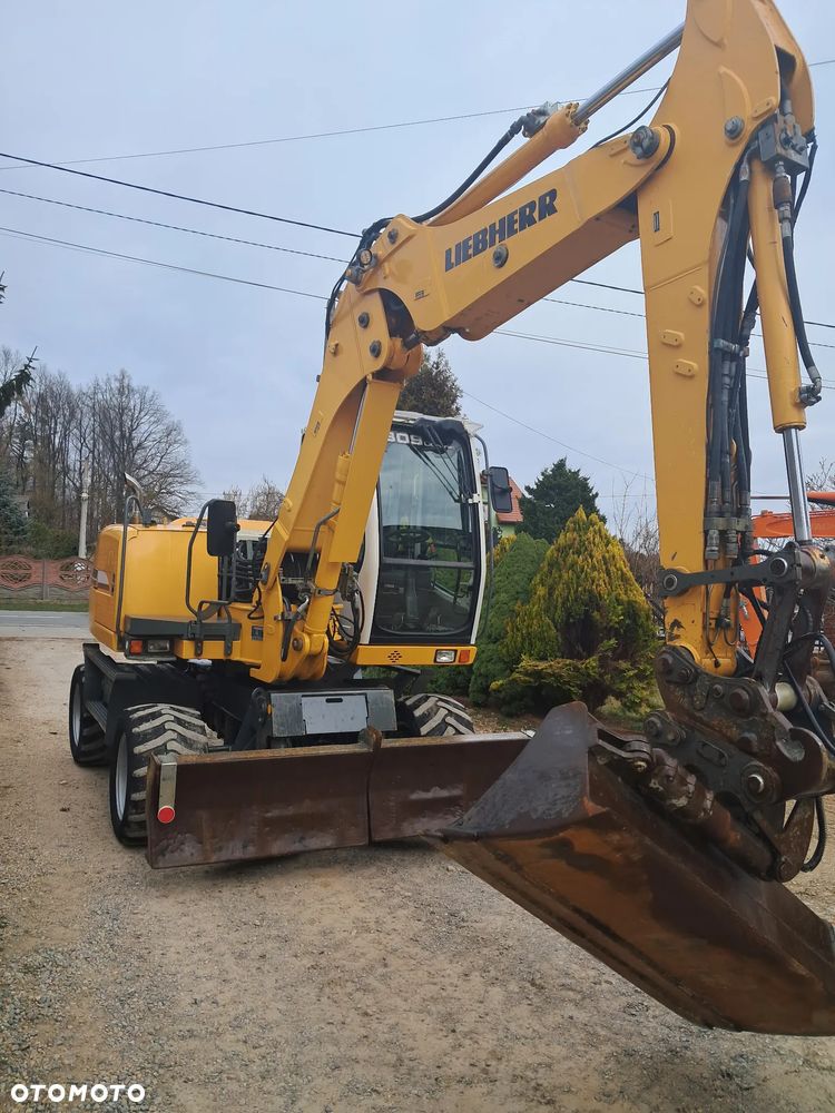 Liebherr 309 Litronic - 2