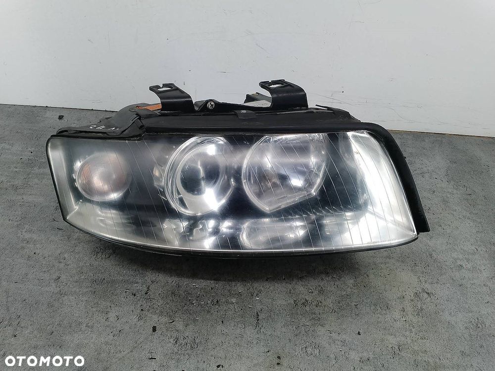 LAMPA PRZÓD PRAWA XENON AUDI A4 B6 20-B213 TYC - 1