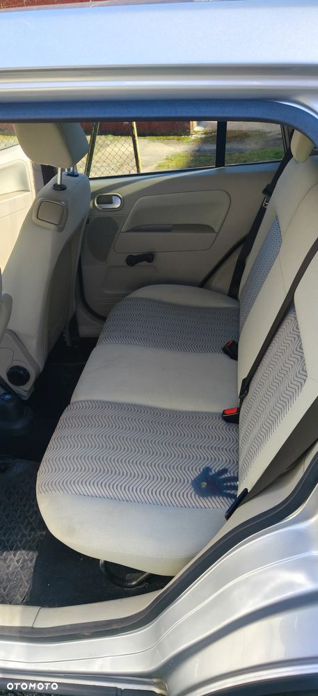 Ford Fusion 1.4 + - 15