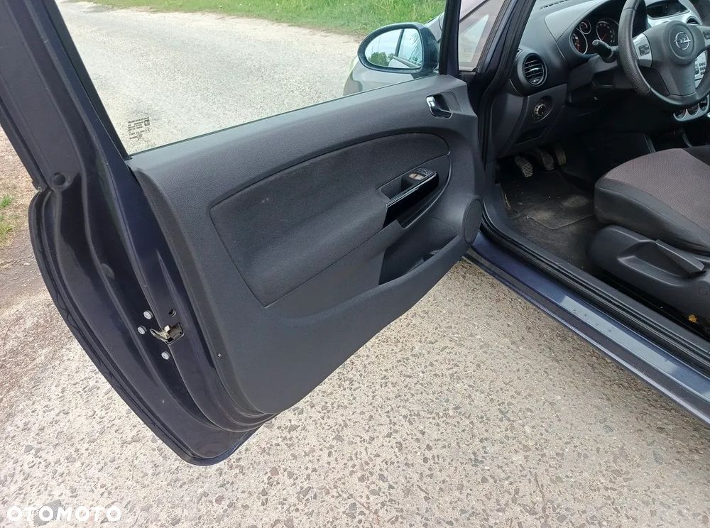 Opel Corsa 1.4 16V Enjoy - 21