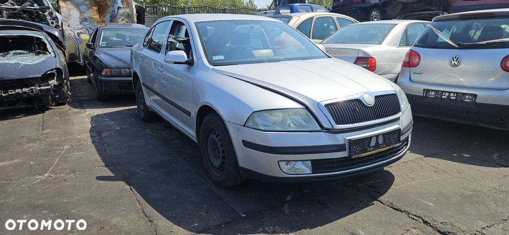 SKODA OCTAVIA II  04-08 1.9 TDI BKC - OSLONA PRZECIWSLONECZNA LEWA PRAWA - 3