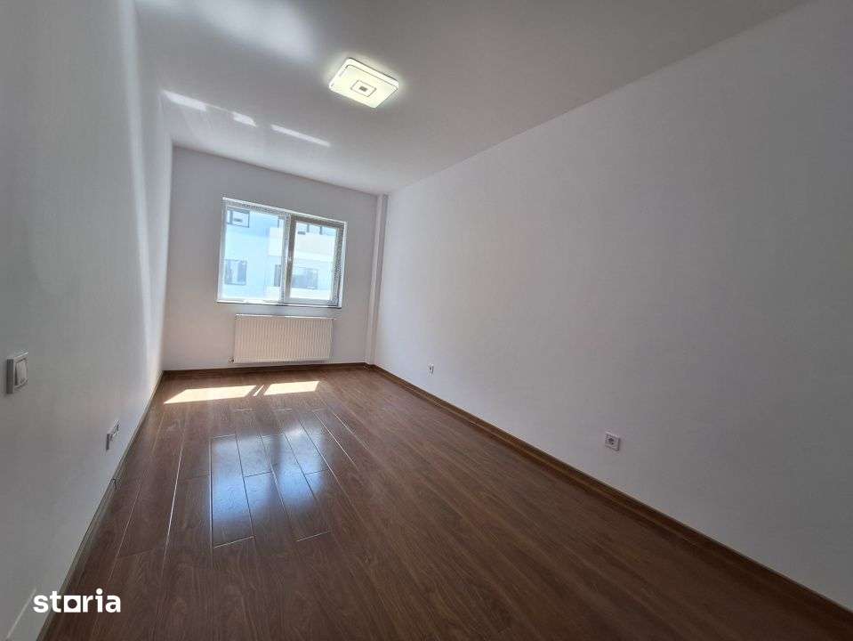 Apartament cu 3 camere, 55 mp, balcon, zona Terra — fotografia 3