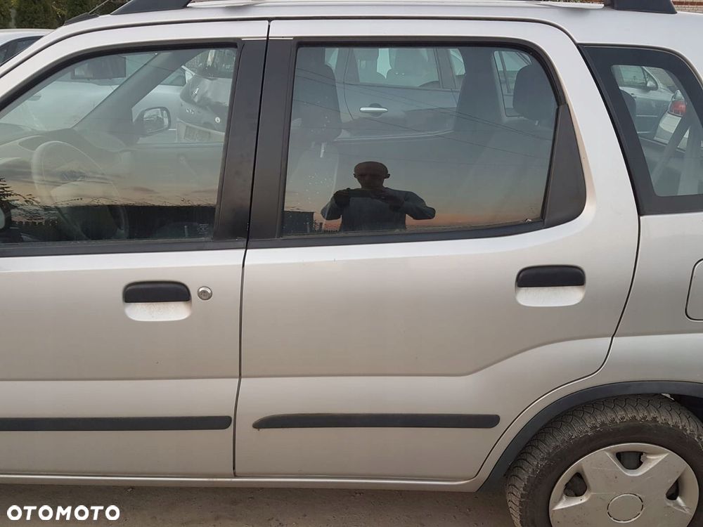 SUZUKI IGNIS 00- DRZWI LEWE TYŁ TYLNE ZS2 SREBRNE - 1