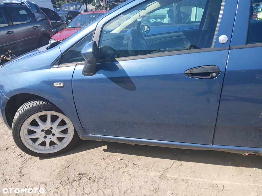 Fiat Grande punto 5d 1.2 MPI 8V CF4 65km 199 A4.000 silnik skrzynia napęd sanki belka wahacz wahacze zacisk zaciski zwrotnica piasta kopyto mc person amortyzator - 9