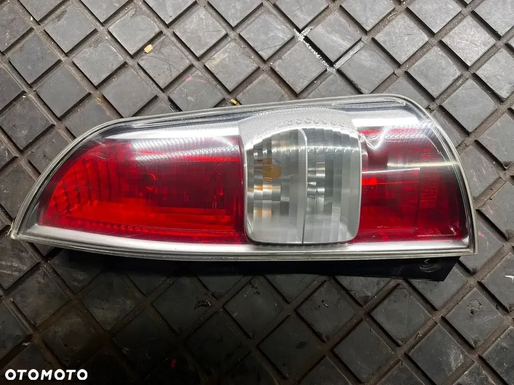 DAIHATSU SIRION SUBARU JUSTY 07-10 LAMPA PRAWA TYLNA 220-51762 EUROPA POSIADAM 2 SZT - 1