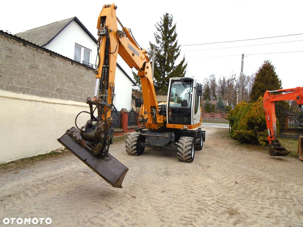 Liebherr 309 Litronic - 2