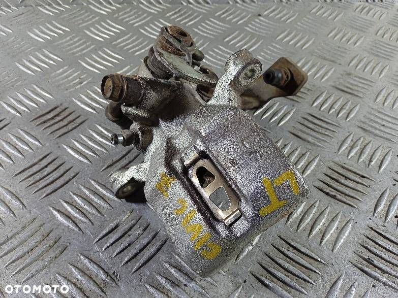 ZACISK LEWY TYLNY HONDA JAZZ 2 - 1
