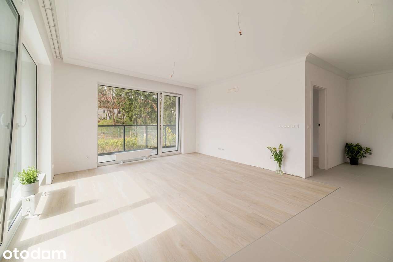 Apartament z narożnymi przeszkleniami i tarasem 22,55 m²