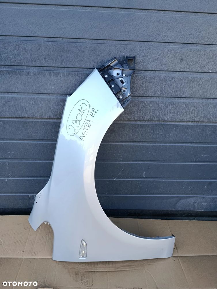 OPEL ASTRA J IV 4 BŁOTNIK PRAWY PRZÓD PRZEDNI - 1