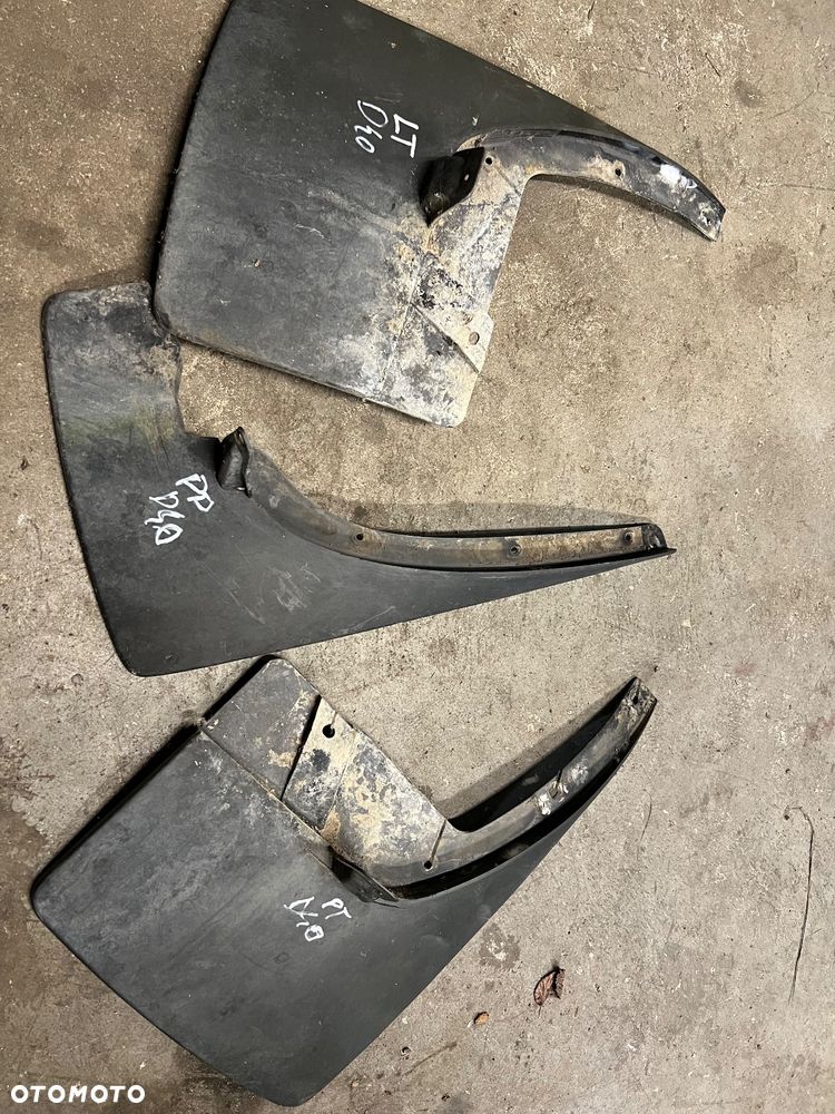 Chlapacz przedni tylny lewy prawy Nissan Navara d40 - 1