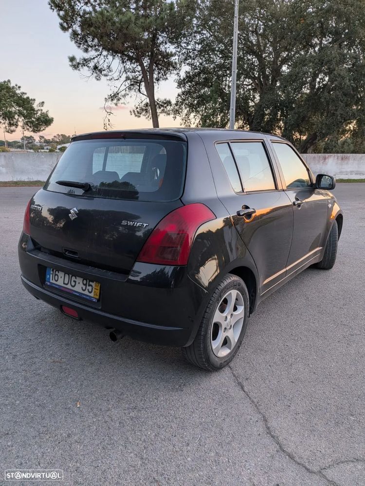 Suzuki Swift 1.3 DDiS GLX - 8