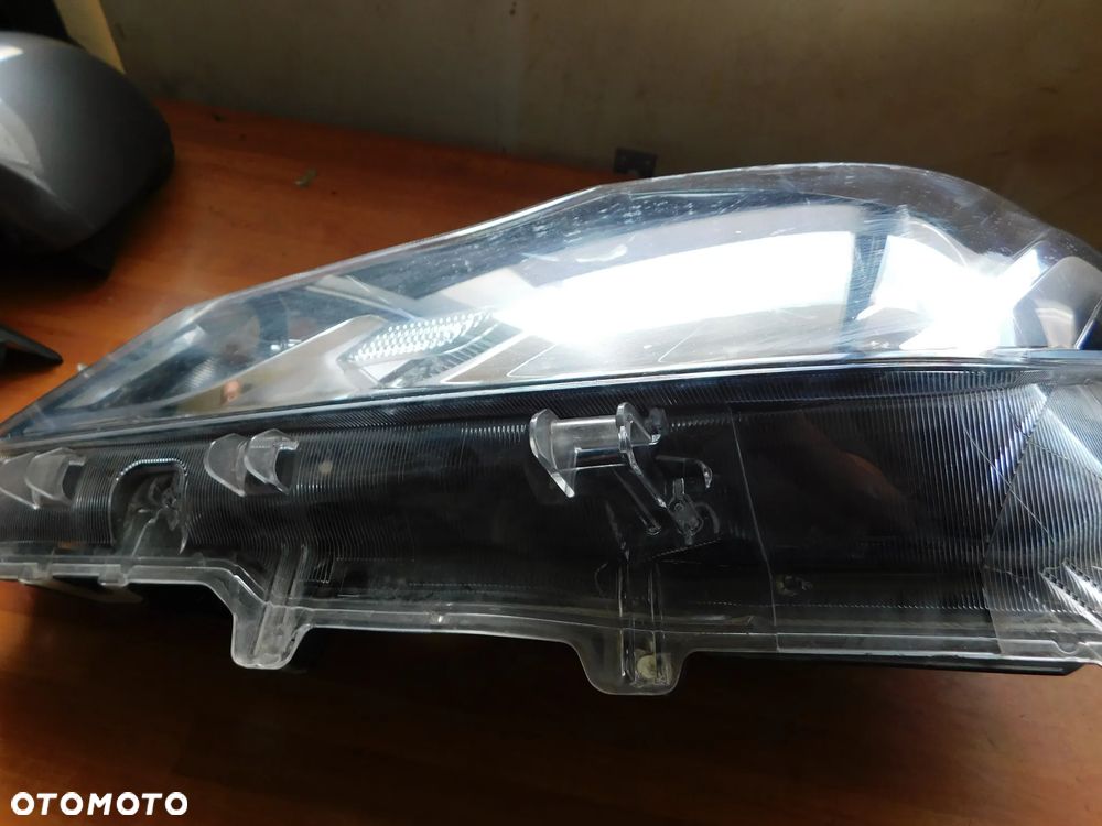 lampa lewa przód TOYOTA COROLLA E21 EU - 6