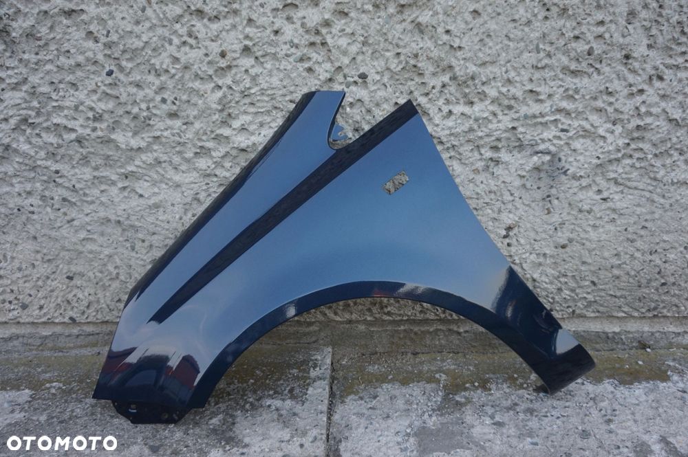 BŁOTNIK PRZEDNI LEWY OPEL CORSA D Z22A - 1