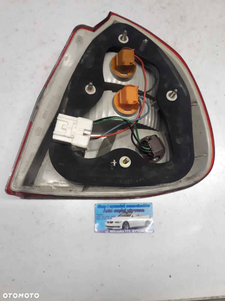 LAMPA  LEWY TYŁ  MITSUBISHI CARISMA II 1,9 DID  2002r   151085 - 2