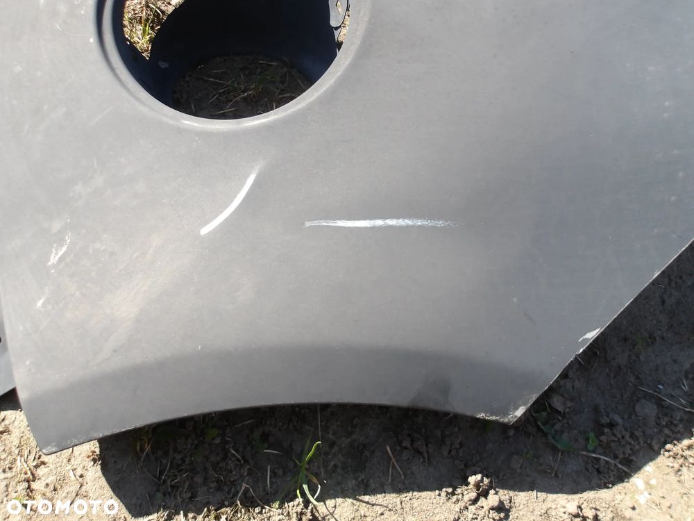 BLOTNIK PRAWY TYL OPEL CORSA D 5D - 9