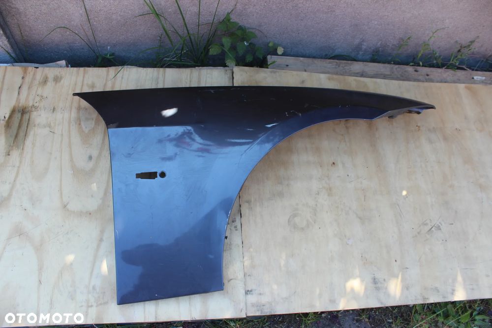 BŁOTNIK PRAWY PRZEDNI BMW E90 E91 2007