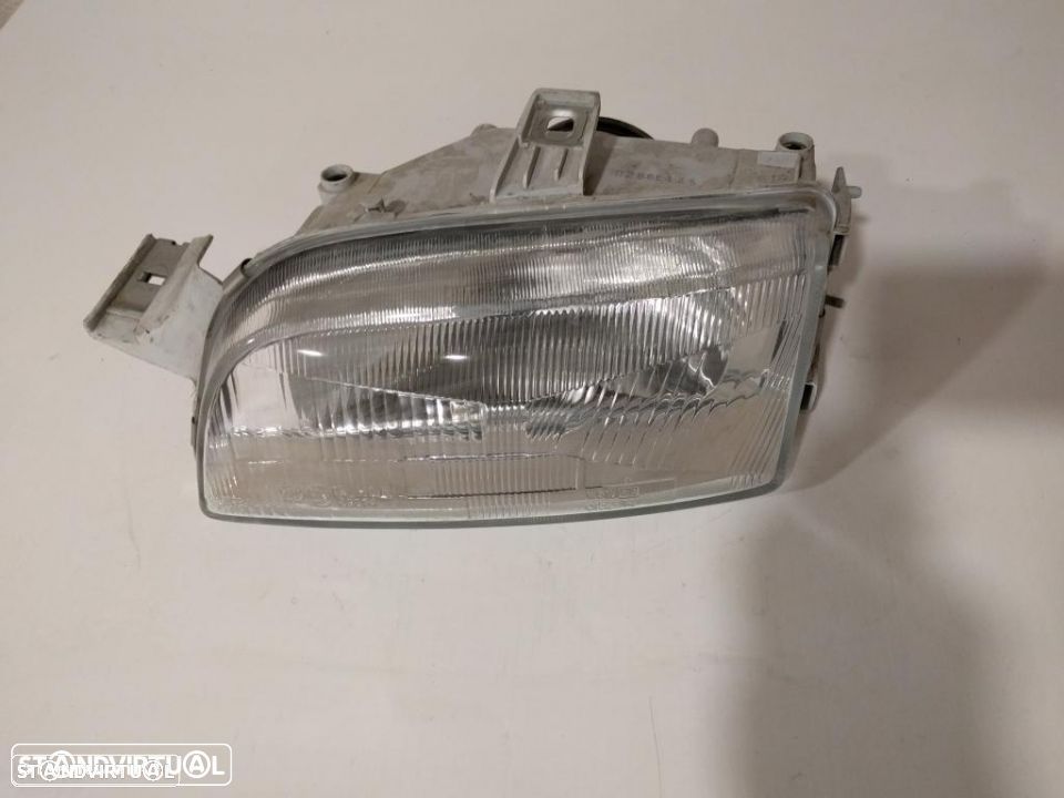 farol optica esquerdo fiat punto mk1 1993 a 1999 - 1