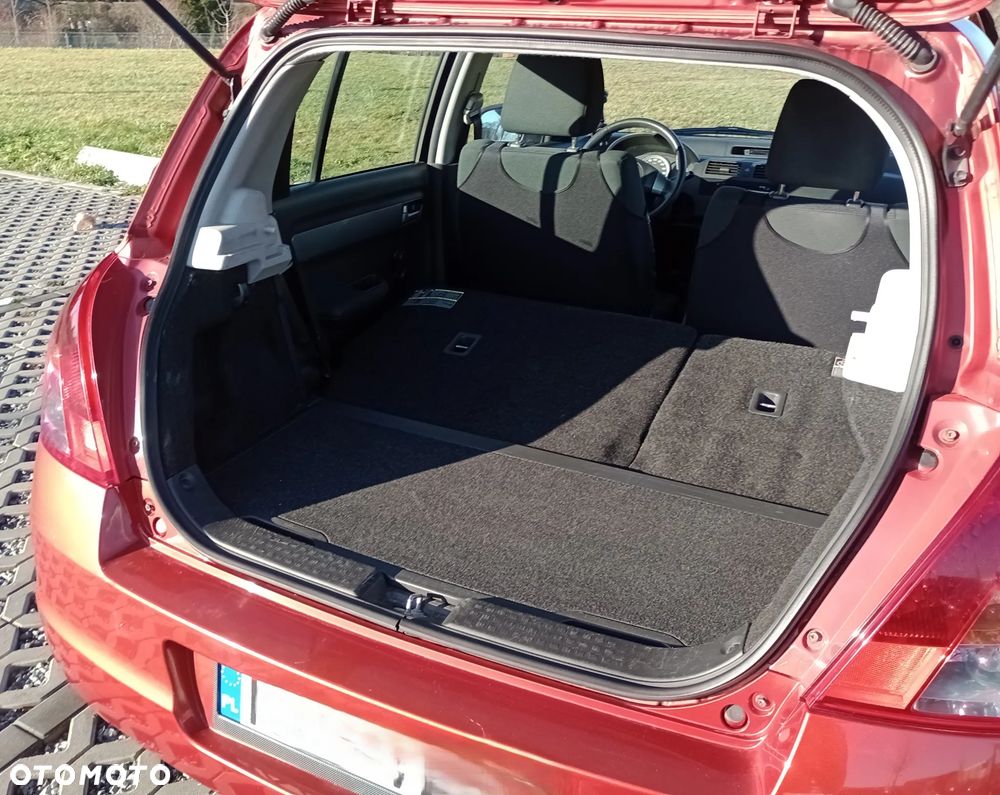 Suzuki Swift 1.3 Club - 4