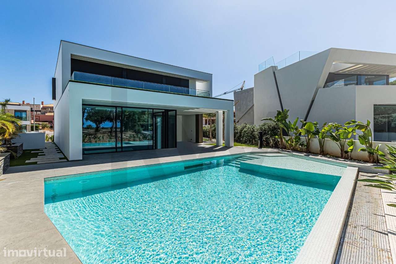MORADIA T5, SUITES, PISCINA, ZONA CALMA, JUNTO DO GOLF, QUARTEIRA, VIL - Grande imagem: 2/24