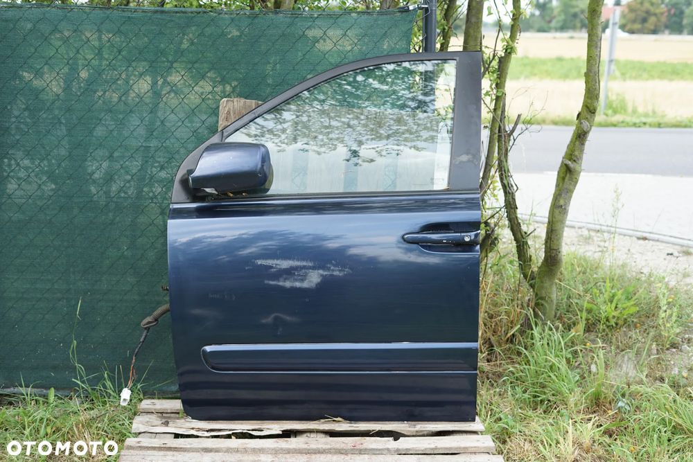 Drzwi przód przednie lewe Kia Carnival II Sedona II - 1