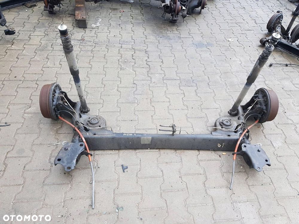 DACIA DUSTER I LIFT 13-17r 1.2 TCE BELKA ZAWIESZENIA TYŁ - 1