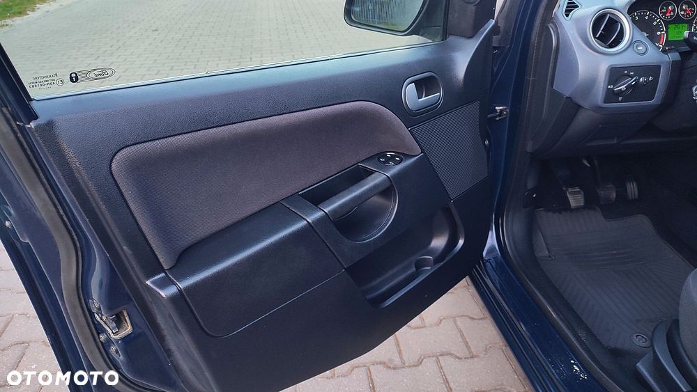 Ford Fiesta 1.4 Ghia - 32
