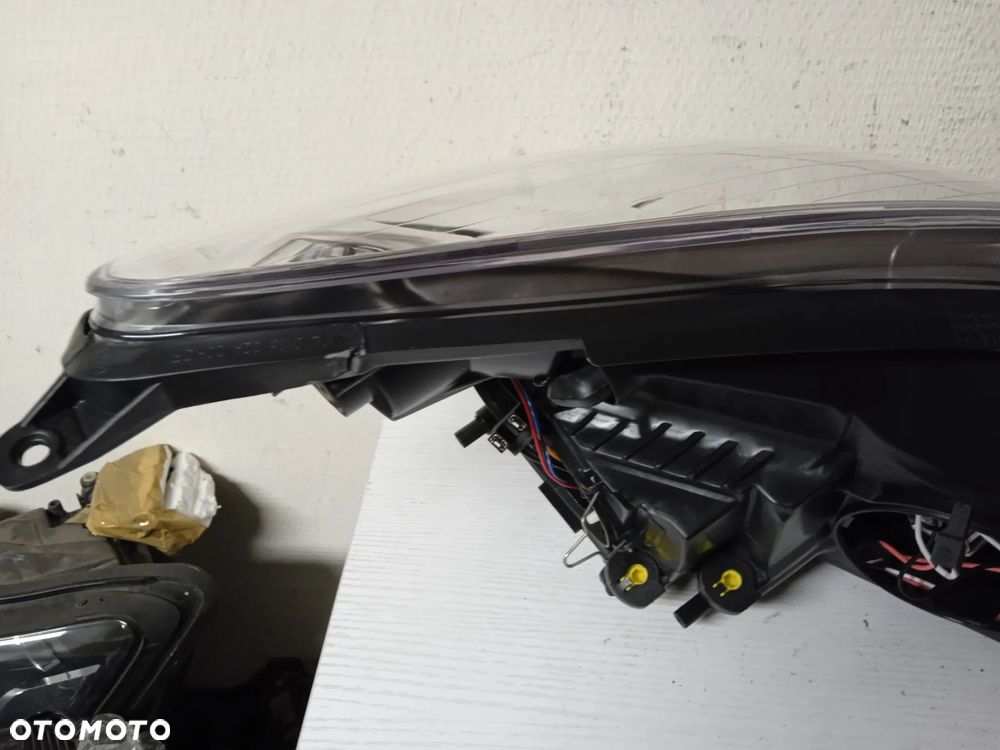 REFLEKTOR OPEL CORSA D LEWY LUB PRAWY NOWY - 6