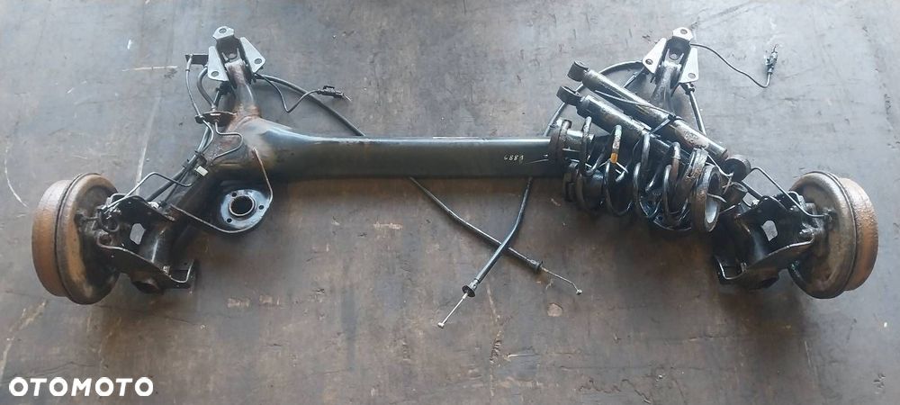 BELKA OŚ ZAWIESZENIA TYŁ BĘBNY Z ABS AMORTYZATORY SPRĘŻYNY FIAT IDEA - 1