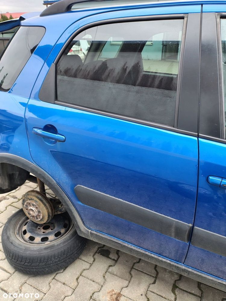 SUZUKI SX4 DRZWI PRAWE TYŁ TYLNE GOŁE - 1
