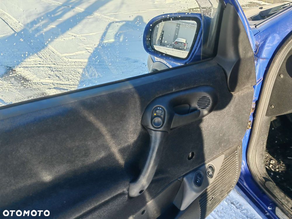 Opel Corsa 1.2 16V Sport - 11