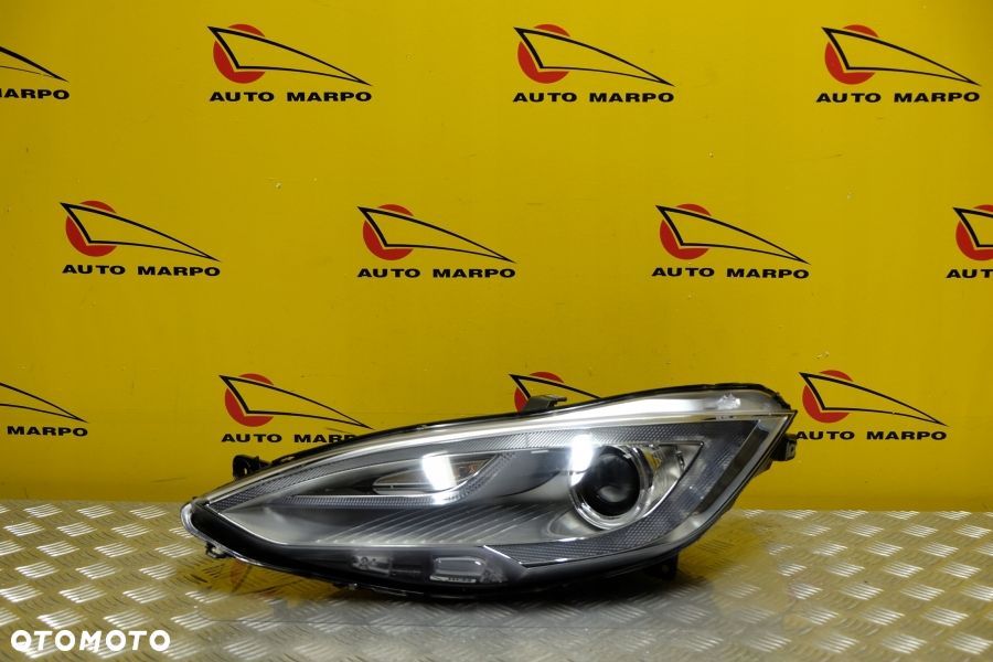 TESLA MODEL S 2012- REFLEKTOR LAMPA XENON LEWA USA - 2