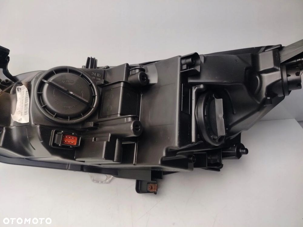 OPEL ASTRA J 09R- REFLEKTOR LAMPA PRAWY PRZÓD PRAWA PRZEDNIA - 9