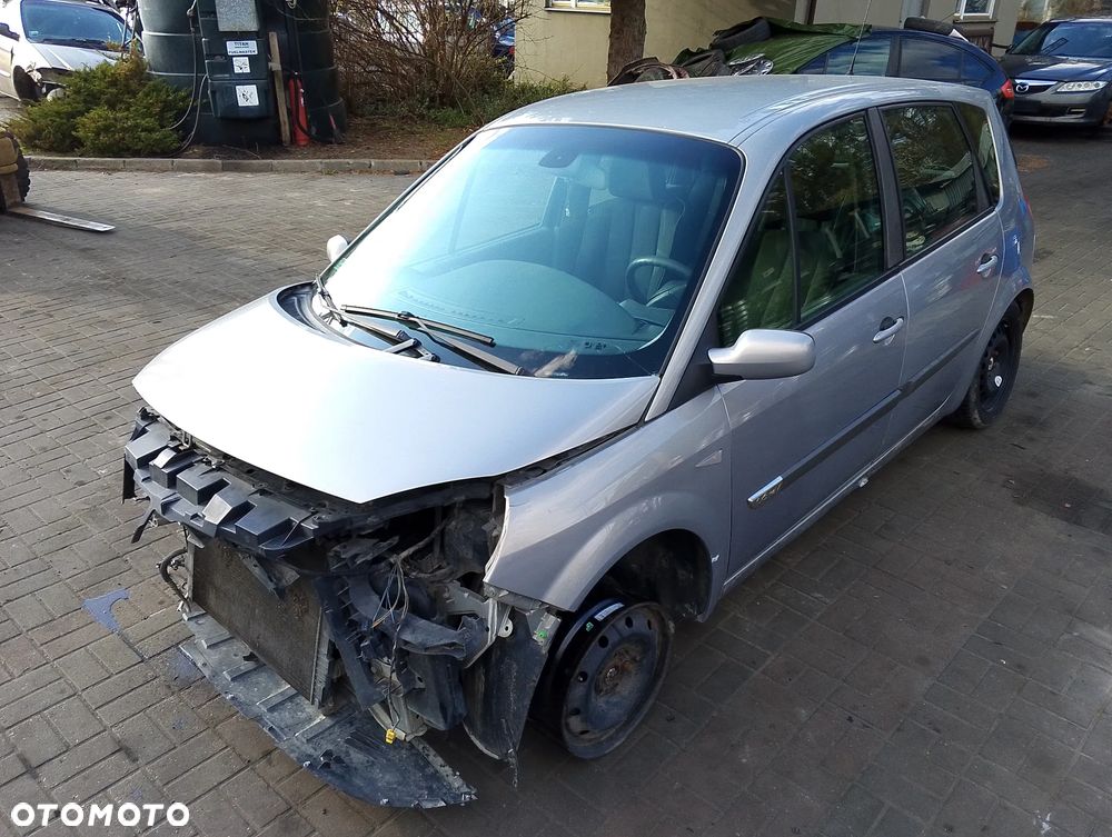 Renault Megane Scenic II (03-06r.) 1.6B 112KM. Silnik K4M 782 (K4M782),  K4M 761 (K4M761)  Skrzynia JR5 104 (JR5104),  8200210038,  A040566   lakier TEA19.Cały na części. GWARANCJA !!! Przód Tył Zestaw Komplet Drzwi Klapa Zderzak Błotnik Maska Grill Atrapa Szyba Pas Lampa Lusterko Boczki Fotel Kanapa Kokpit Deska Rozdzielcza Przełącznik Włącznik Sterownik Przewody Wiązka Instalacja Moduł Komputer Czujnik Listwa Pompa Alternator Wtryski Głowica Rozrusznik Kompresor Sprzęgło Dwumas Silnik Skrzynia ABS Klimatyzacji Paliwa Wspomagania Kolektor Turbina Przepustnica Zawór Chłodnica Koło Hak Belka Sanki Zawieszenie Mcpherson Półoś Amortyzator Wydech Tłumik Zacisk Most - 1
