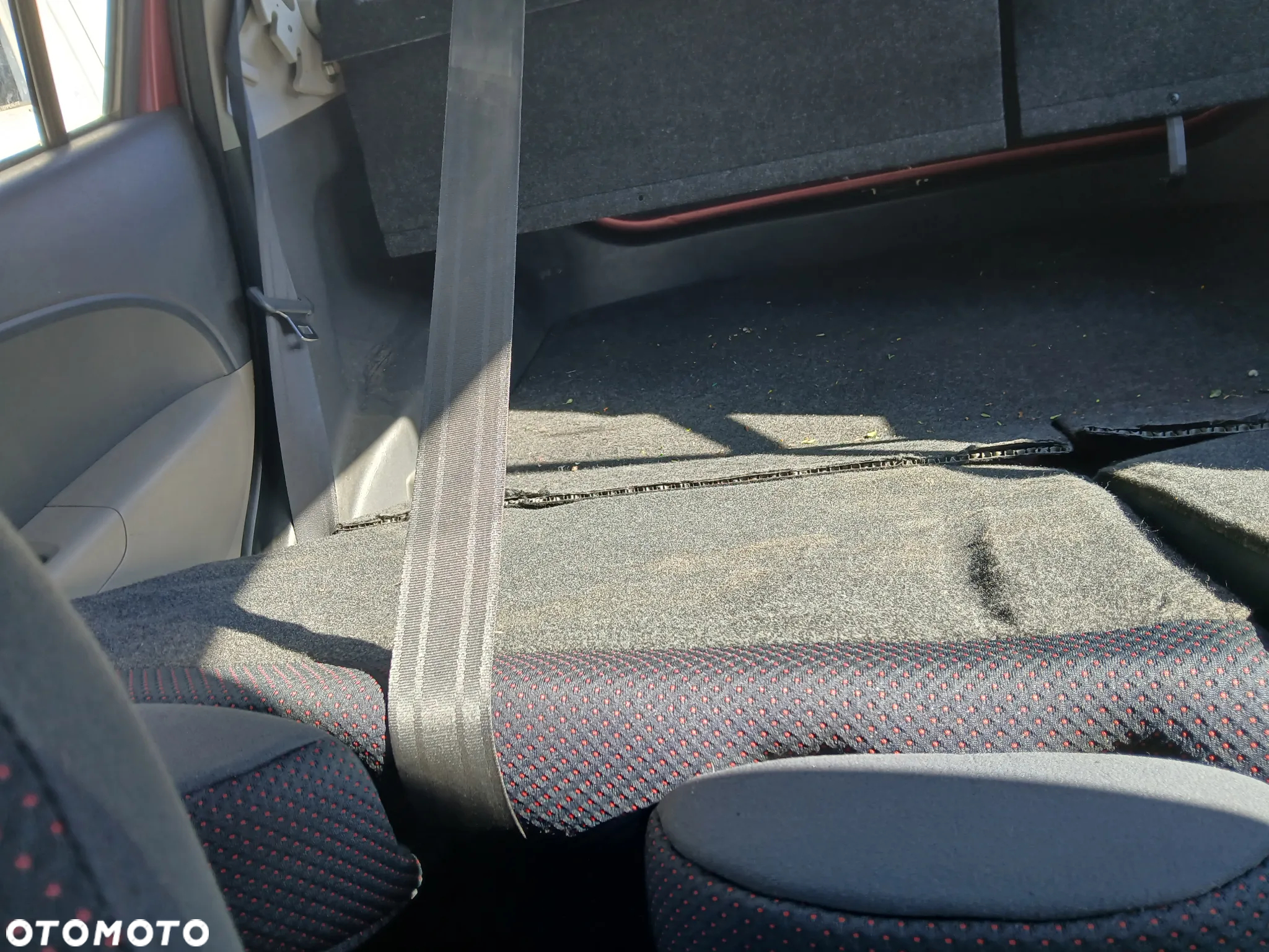 daihatsu sirion II 05/10 fotel fotele kanapa deska kokpit podsufitka boczek boczki klamka podłokietnik licznik - 5