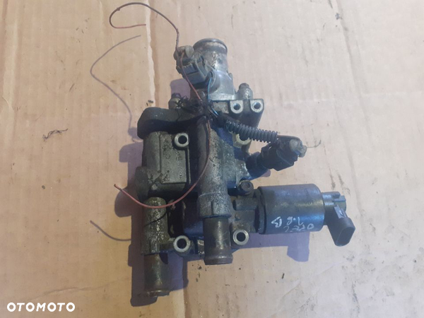 OBUDOWA TERMOSTATU OPEL 1.6B 55577072 55559594