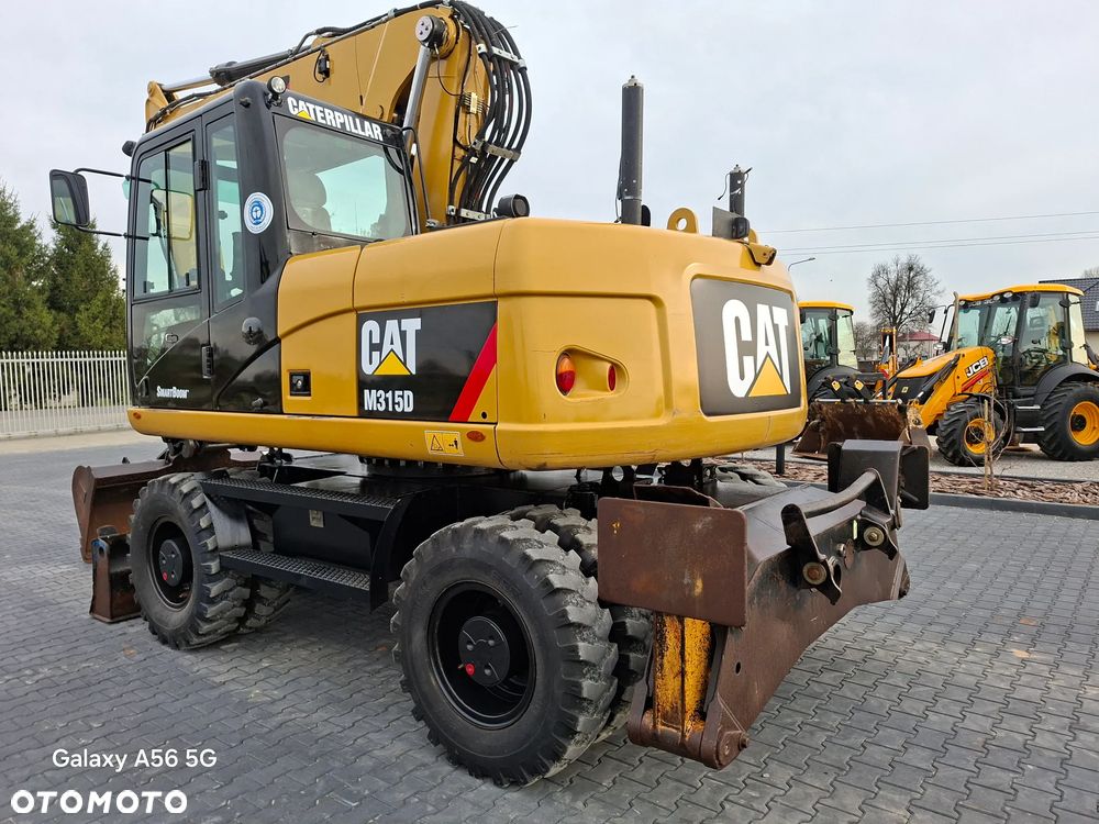 Caterpillar CAT M315D rok 2012 - 9
